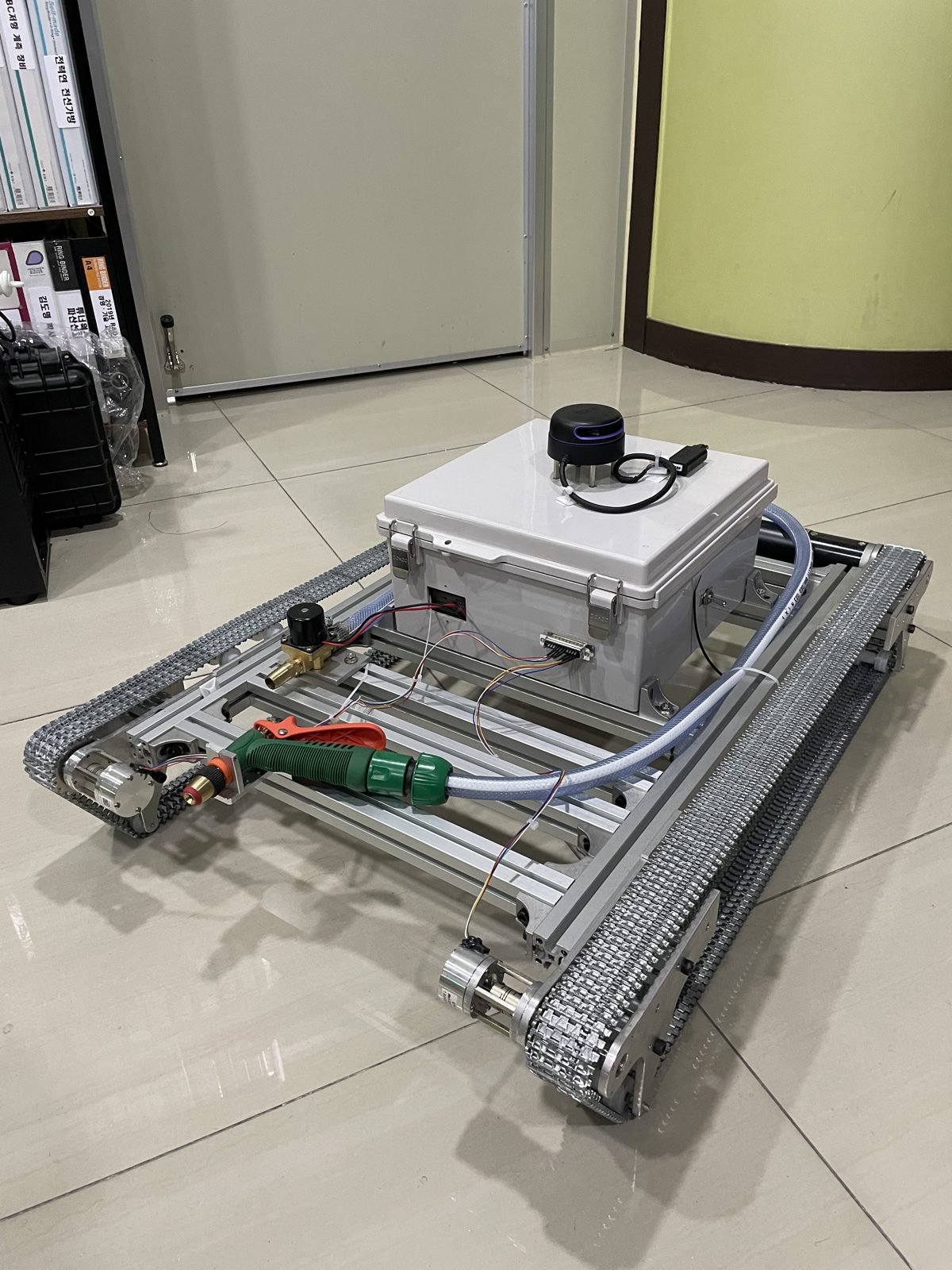 Assembled robot frame with tracks and enclosure